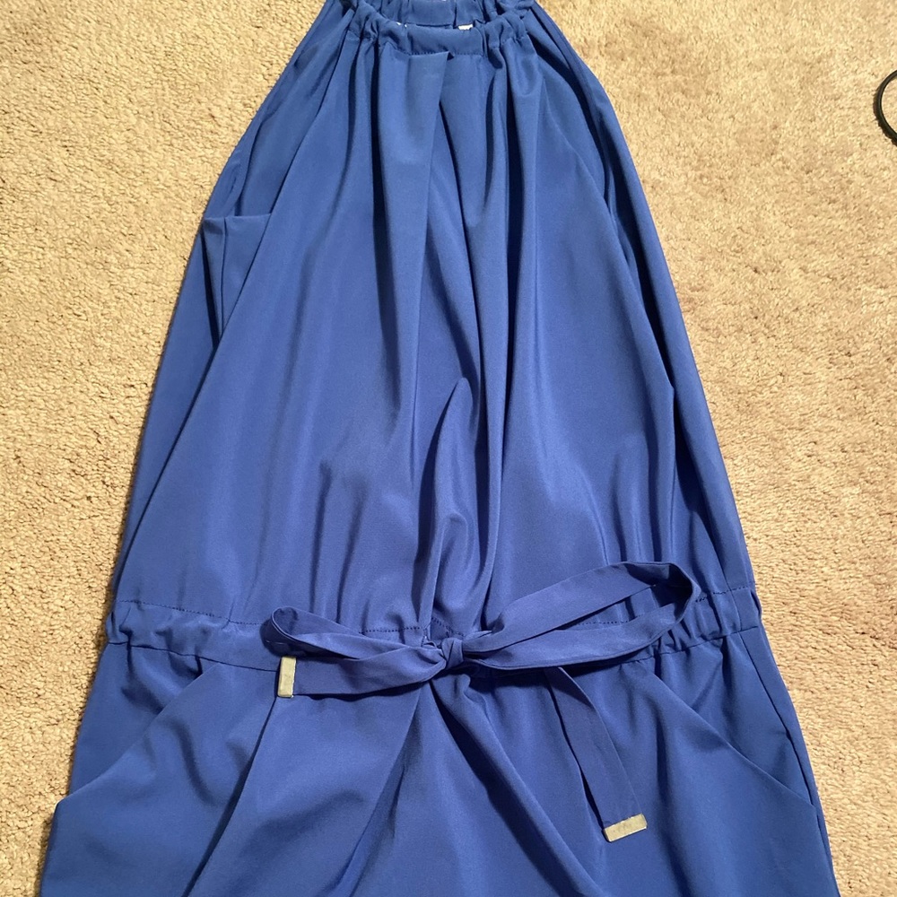 Blue haulter top mini dress front and back pockets